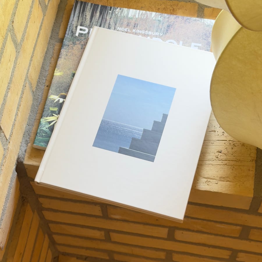 Portrait hardcover book on a table